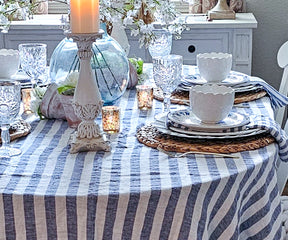 Striped linen tablecloths feature a classic design that adds a timeless and stylish touch to any dining table