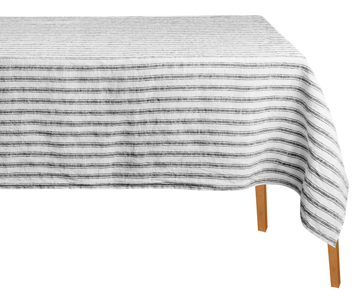 "Black and white tablecloth creating a bold contrast for a modern aesthetic.
