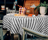 Elegant round linen tablecloth in natural color for rectangle tables.