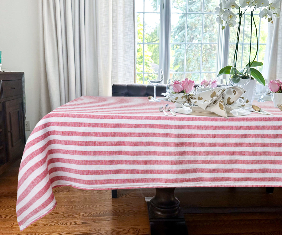 Red linen tablecloth adding a touch of luxury to your table