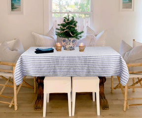 "Rectangular linen tablecloth adding a touch of sophistication to any setting.