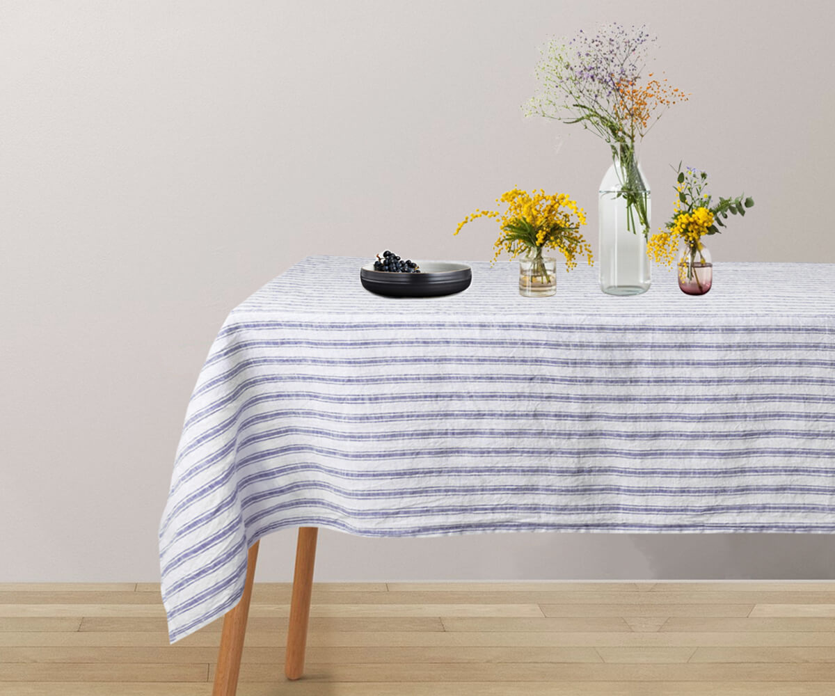 Ticking stripe tablecloth featuring a charming pattern in durable linen fabric.
