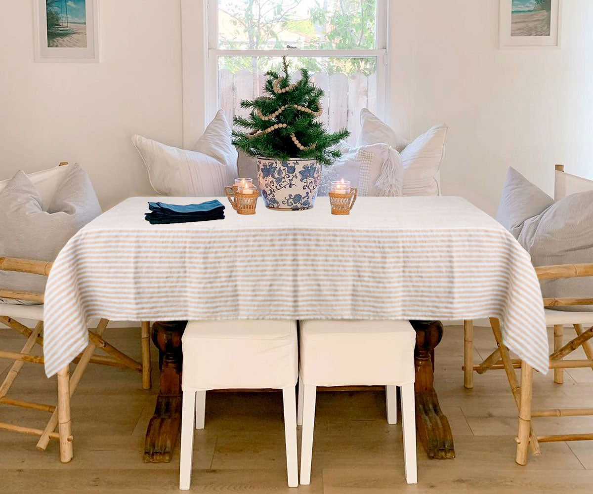 Timeless farmhouse linen tablecloth featuring classic stripes, blending rustic charm with durable, high-quality fabric.