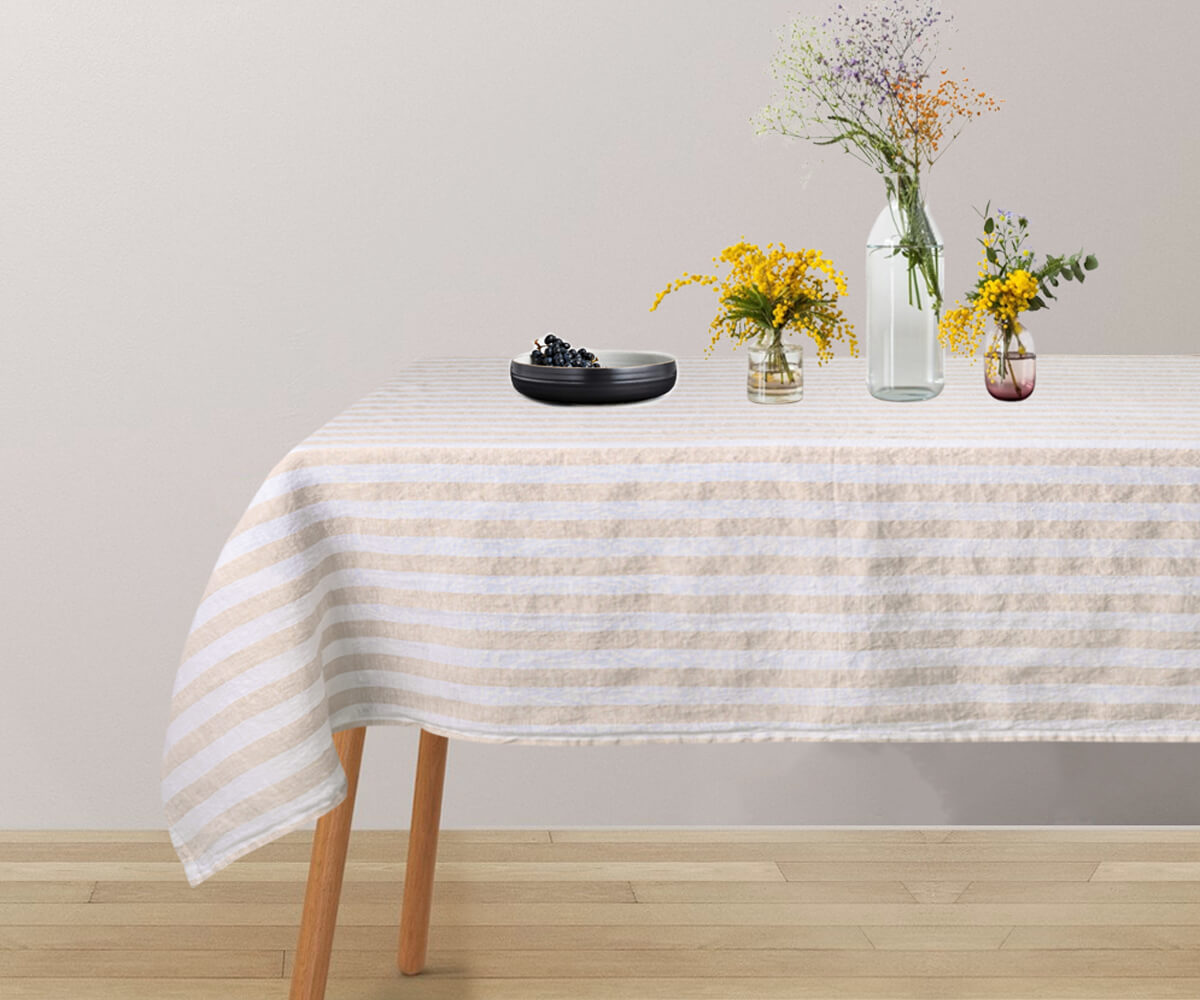 Striped tablecloth adding personality to your table decor.