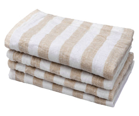 Stack of beige and white striped towels on a white background