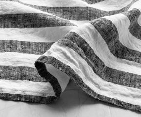 Monochrome image showcasing the striped pattern of an Italian Stripe Napkin