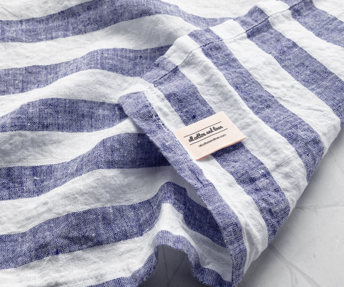Close-up view of Italian Stripe Napkins with blue and white stripes
