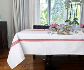 Infuse warmth with White Tablecloths, offering a neutral and inviting palette.