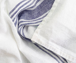 White linen tablecloth with delicate blue striping