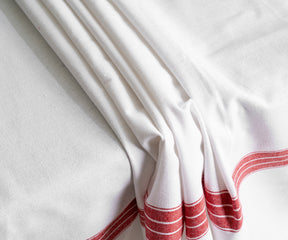 Hemstitched corners for a luxurious look. For farmhouse cloth tablecloths, we recommend washing them at a normal level of water