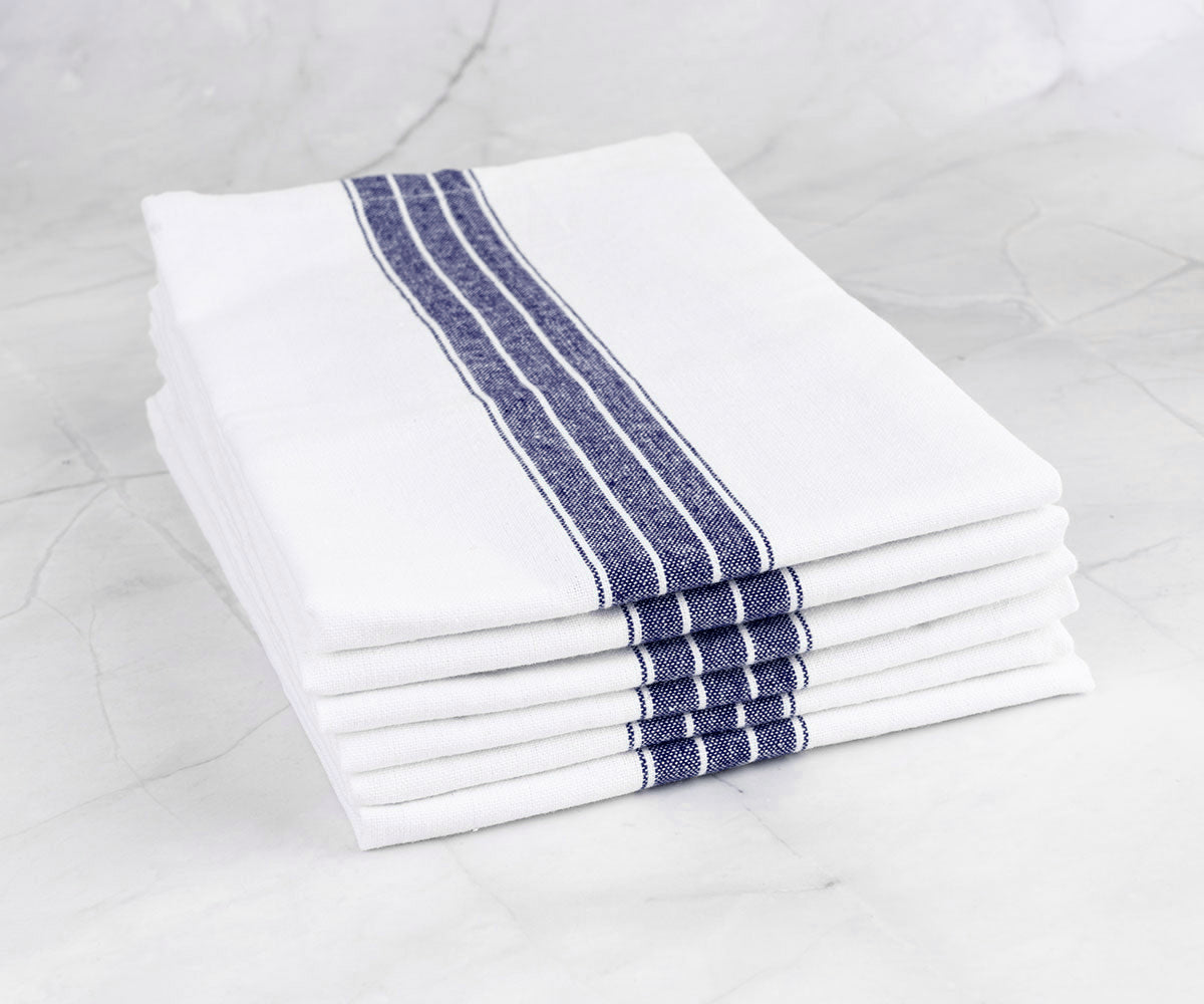 Navy blue cotton napkins, gentle on touch, provide a comfortable and stylish addition to your dining setup.