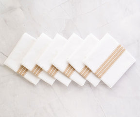Thanksgiving napkins, with their rustic charm, bring a cozy and welcoming touch to your table setting.