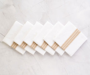 Farmhouse napkins, with their rustic charm, bring a cozy and welcoming touch to your table setting.