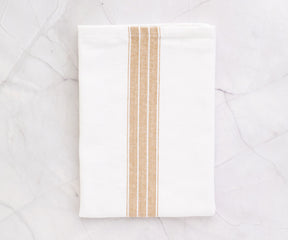 Beige napkins, neutral and versatile, add warmth and sophistication to your dining experience.