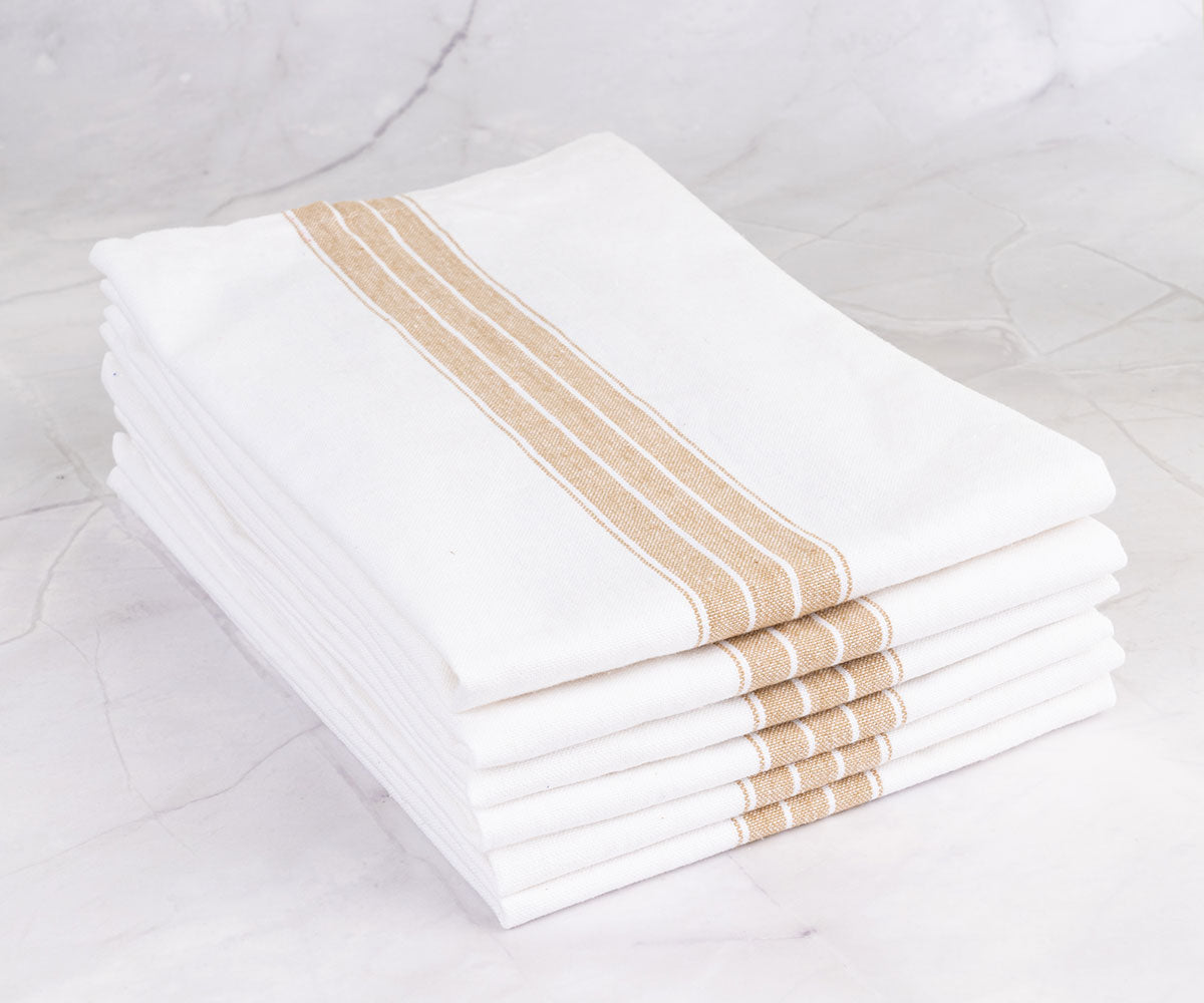 Essential table napkins in various styles, including farmhouse and beige, enhance your table decor effortlessly.
