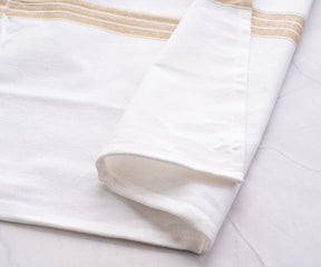 Beige cloth napkins, with their understated elegance, complement a range of dining styles beautifully.