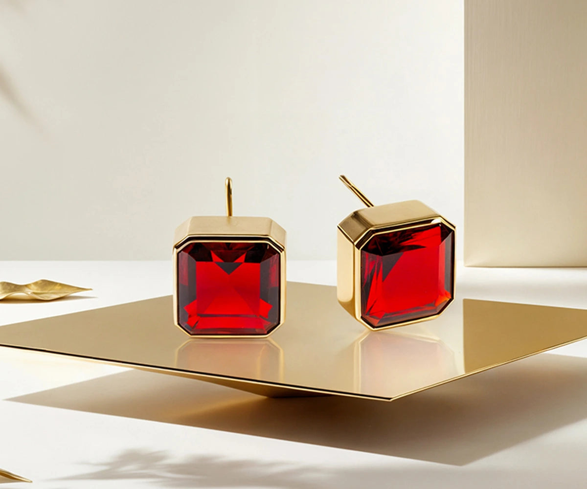 Lightweight 11mm garnet earrings 18K gold with stunning red stones.