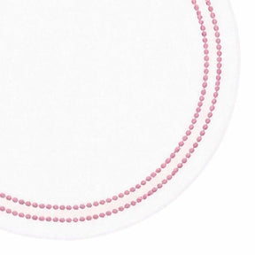 Decorative cotton round table mats styled with embroidered tablecloth and neutral dinnerware