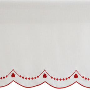 White cotton tablecloth featuring red scalloped edge embroidery