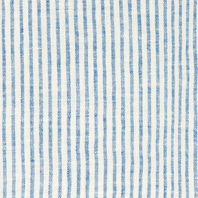 Eco-friendly blue striped linen towels stacked with wooden kitchen tools