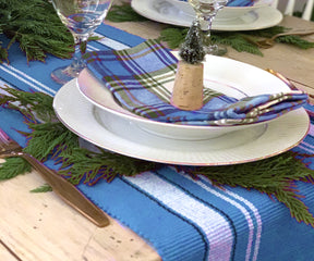 Farmhouse-inspired dining table runner in crisp white.