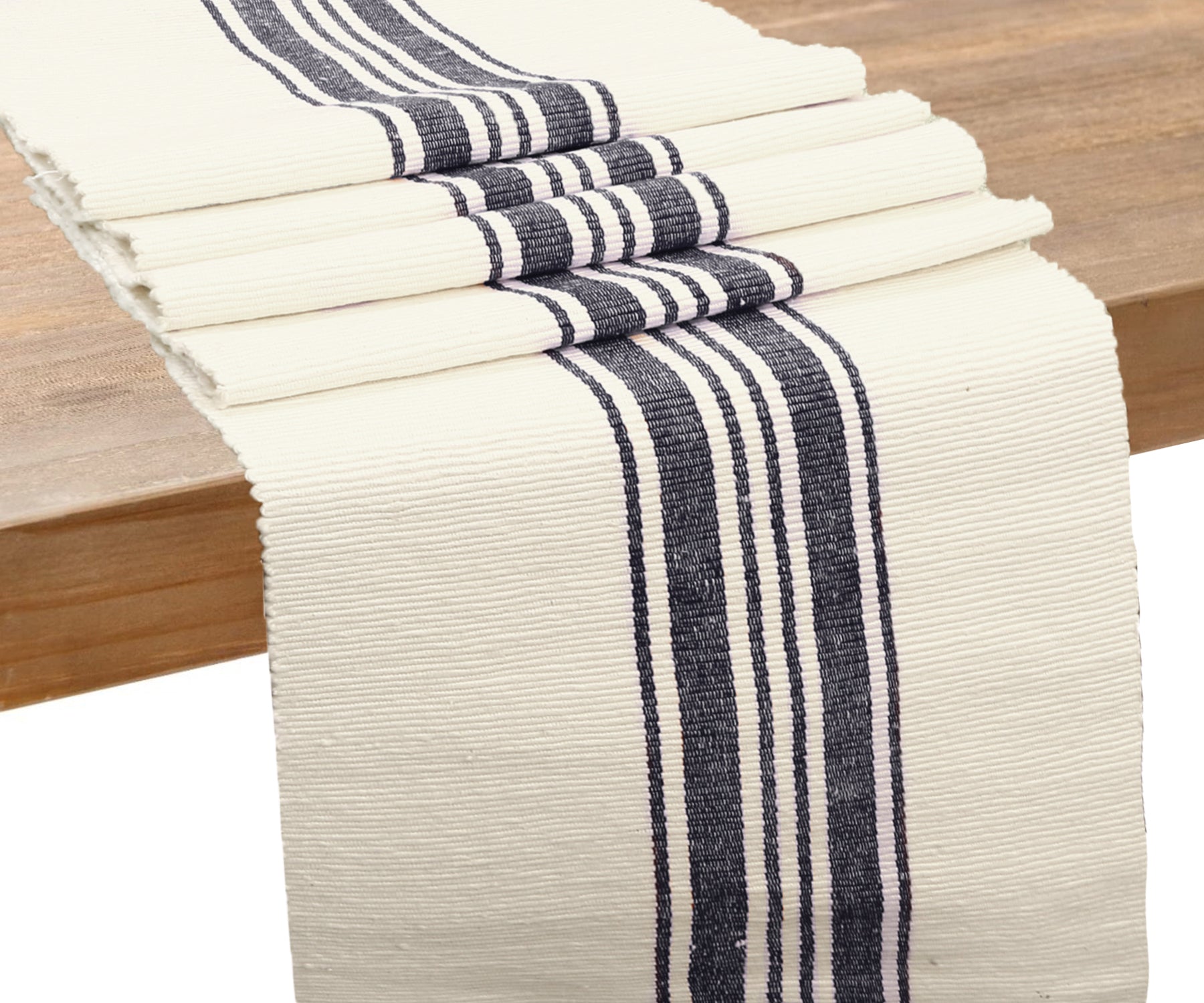 Achieve a farmhouse-inspired look with a striped table runner, enhancing your dining space.