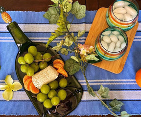 Enhance your round table with a striped table runner.