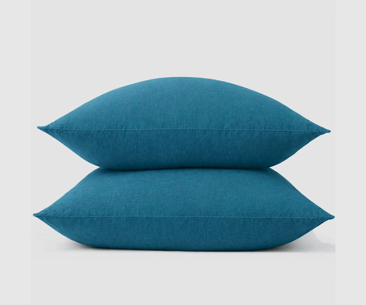 Teal linen pillow covers made from 100% natural linen, breathable moisture-absorbing pillowcases with a soft textured weave for modern bedding