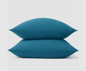 Teal linen pillow covers made from 100% natural linen, breathable moisture-absorbing pillowcases with a soft textured weave for modern bedding