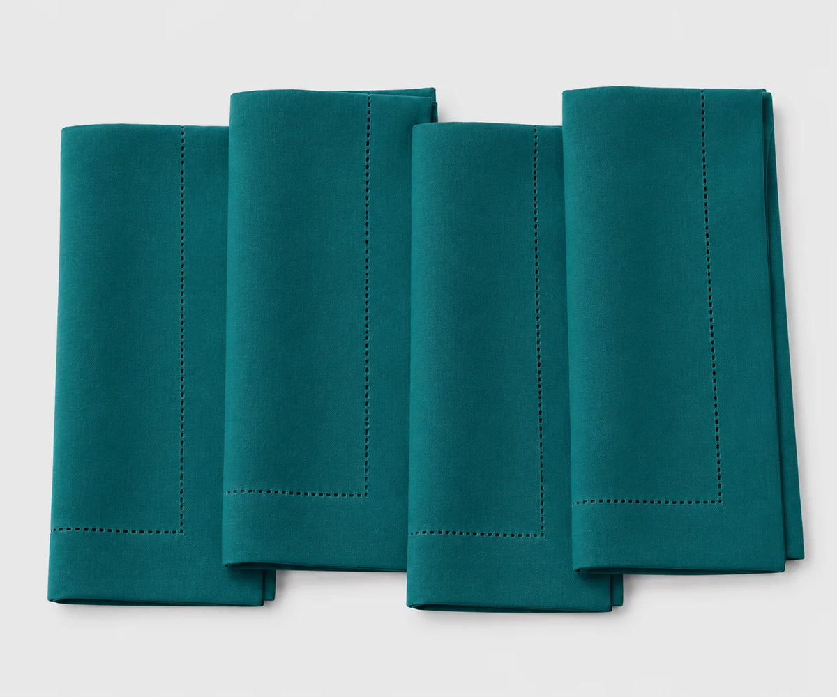 Elegant teal blue cotton hemstitch napkins, reusable washable cloth dinner napkins for weddings, parties, restaurants, and everyday table settings.