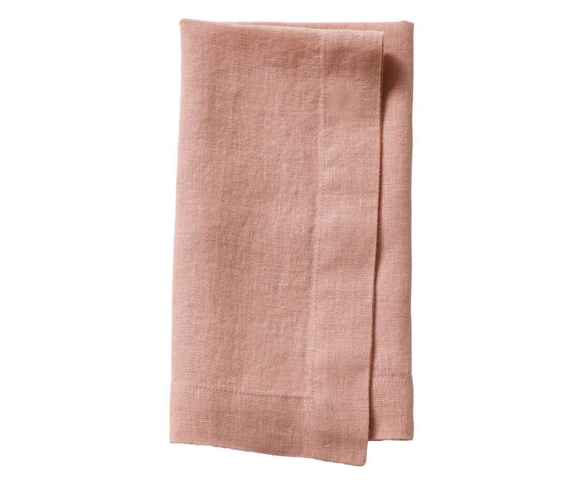 Thistle plain linen napkin in soft lavender shade, folded to highlight smooth linen texture