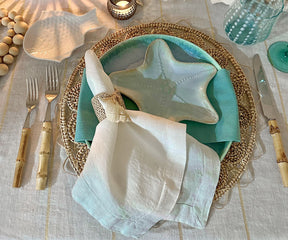 Sustainable and luxurious, white linen napkin for eco-conscious hosts.