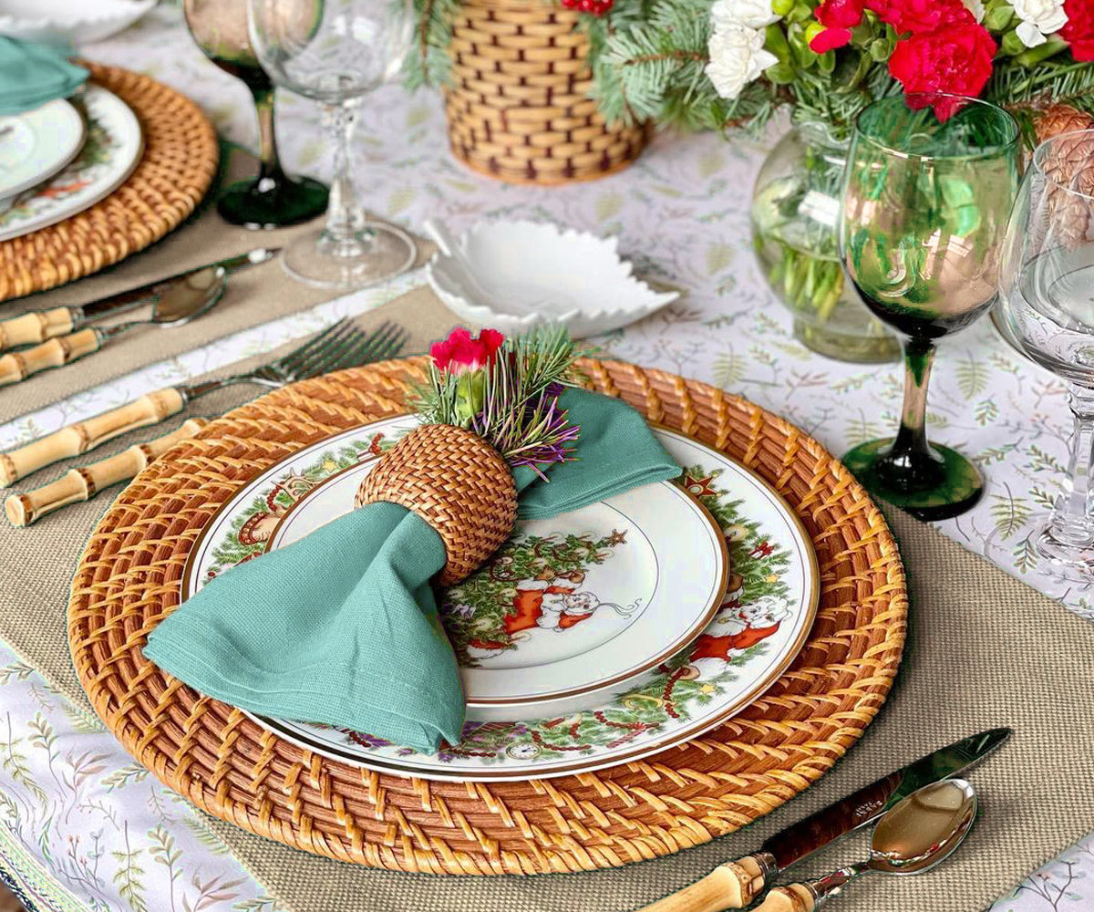  Add a touch of charm and protection to your table with green fabric placemats, elevating your dining experience effortlessly.