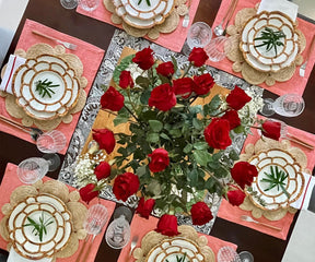  Enhance your dining table with vibrant red fabric placemats, combining elegance and protection for a delightful mealtime ambiance.