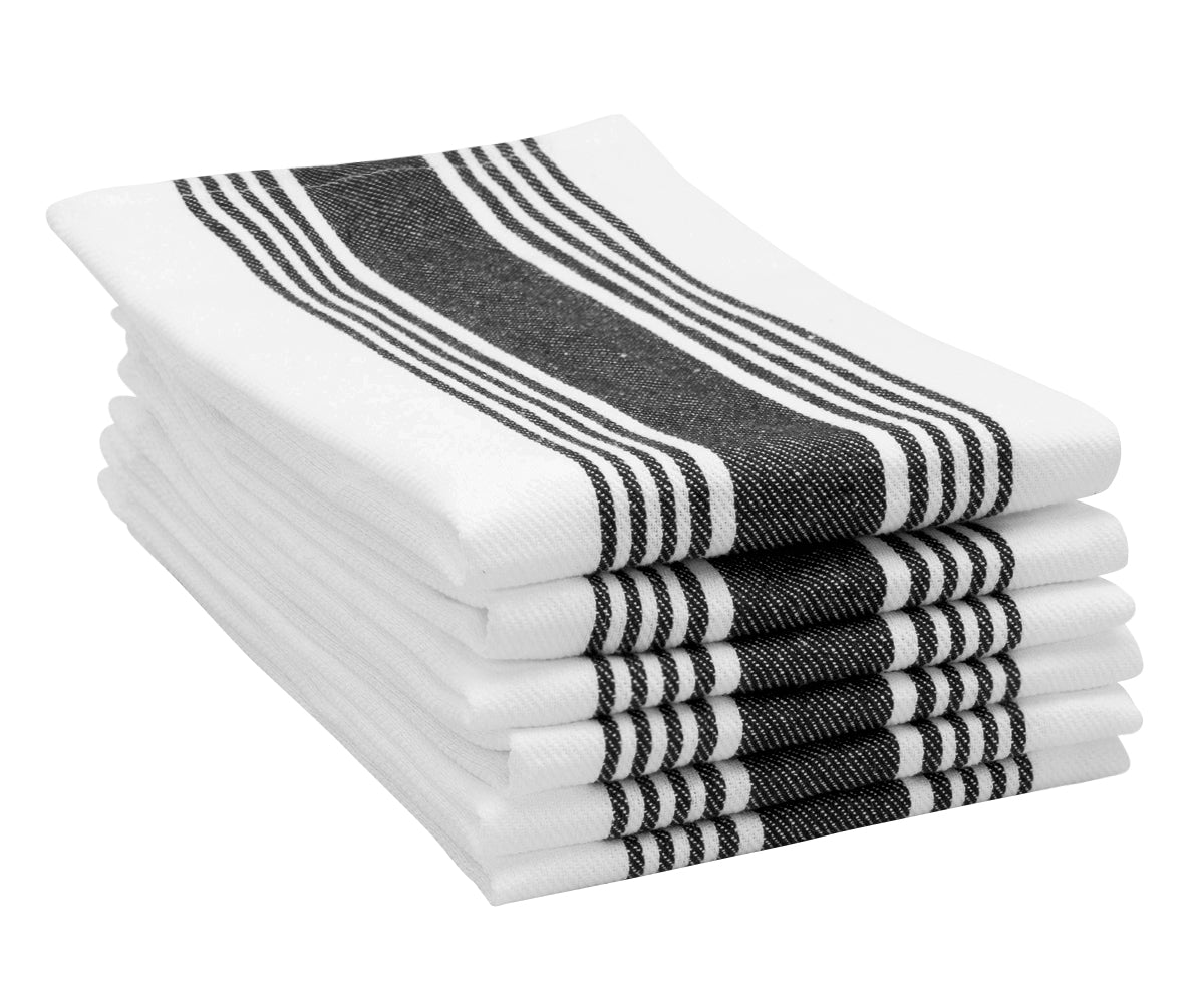 A pile of black striped napkins stacked on each other