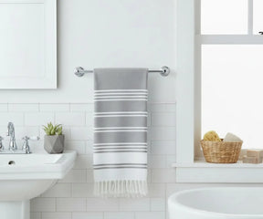 Grey striped Turkish cotton beach towels, set of 2, soft, long-lasting, and ideal for lounging by the pool or after a bath.