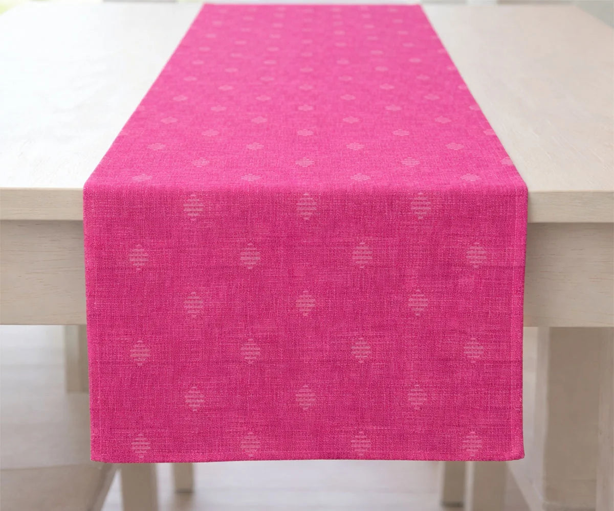Bright pink table runner with subtle small motifs