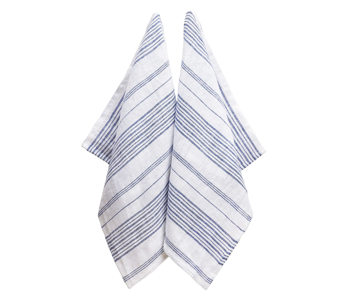 Folded blue and white striped linen kitchen towel on countertop