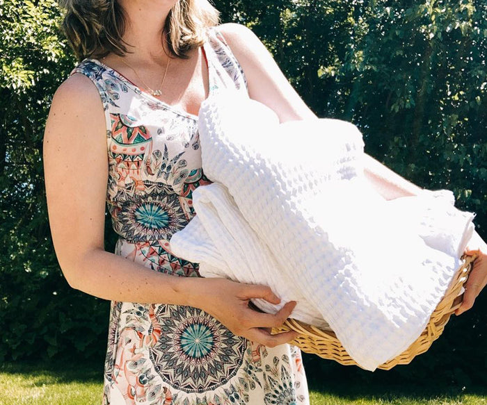 Lightweight cotton waffle bath towel in white, perfect for home, spa and gym daily use