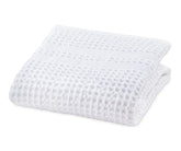 White cotton waffle bath towel with soft and absorbent weave