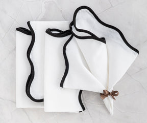 white with black scallop edge napkins