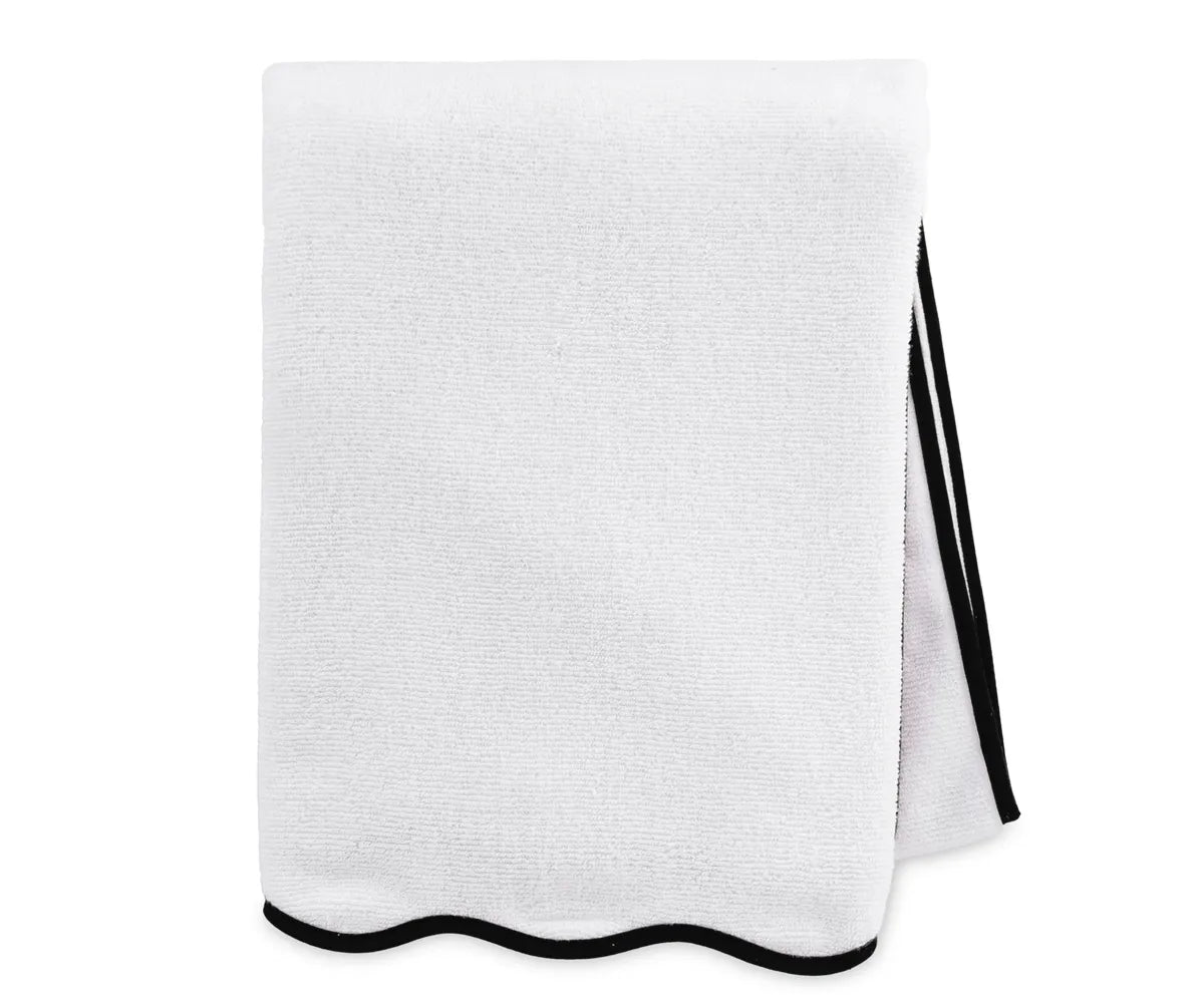 Good quality cotton bath towel in white with black border, featuring plush texture, quick-dry performance, and a modern minimalist design for daily luxury.