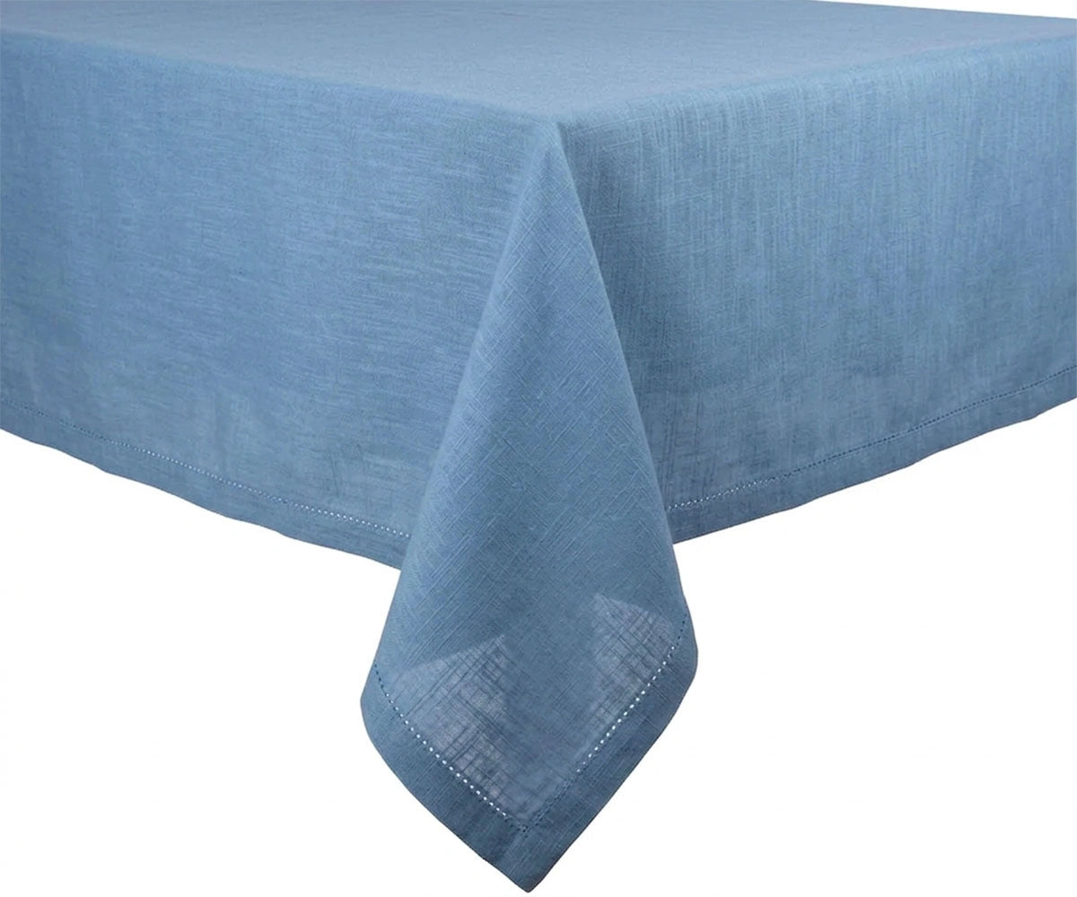 Dust Blue cotton tablecloth draped on table, soft durable fabric for everyday dining