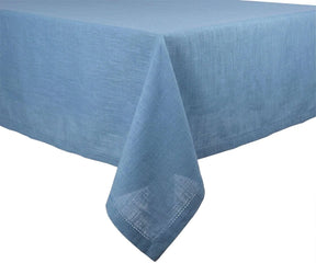 Dust Blue cotton tablecloth draped on table, soft durable fabric for everyday dining