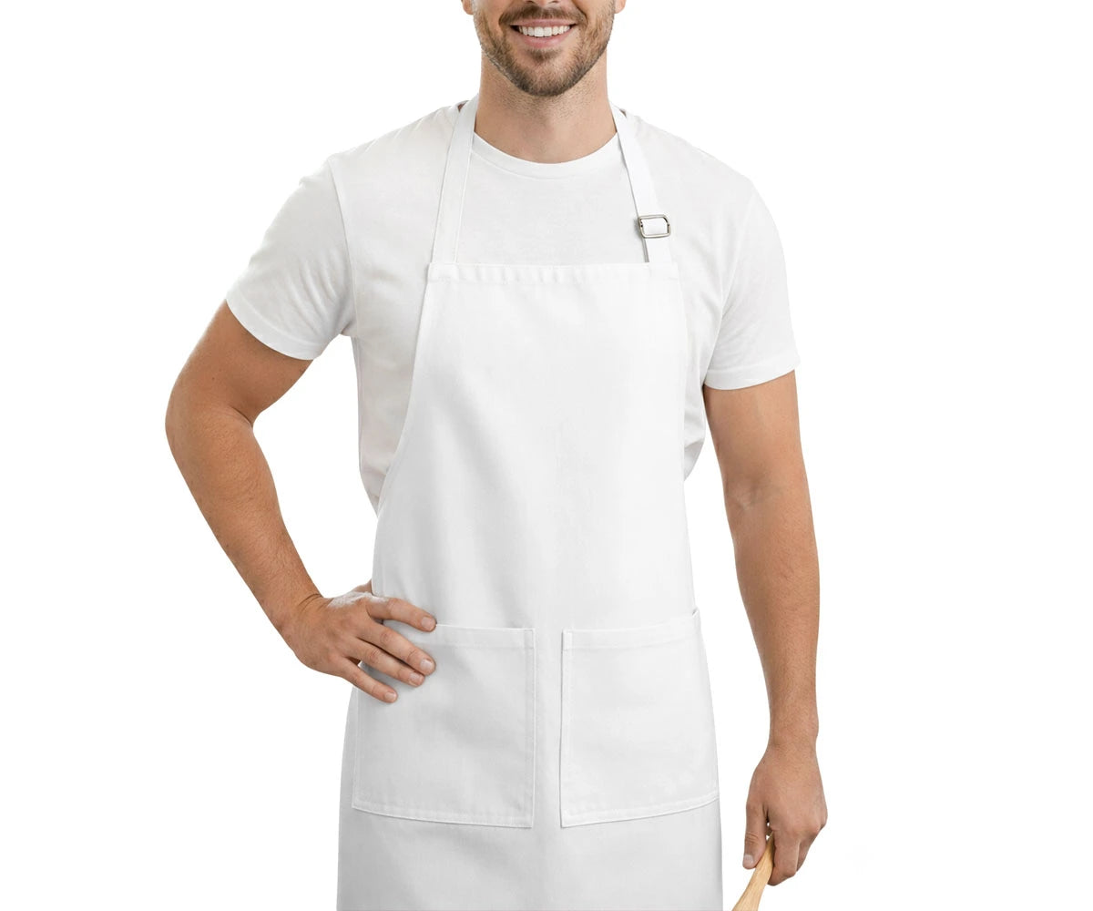 White cotton kitchen apron with adjustable neck strap and large front pockets, ideal for cooking.