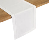 Close-up of classic white linen table runner 14x72 inches – breathable and drapes beautifully for everyday or special dining.