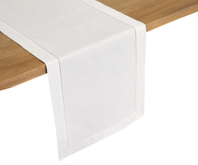 Close-up of classic white linen table runner 14x72 inches – breathable and drapes beautifully for everyday or special dining.