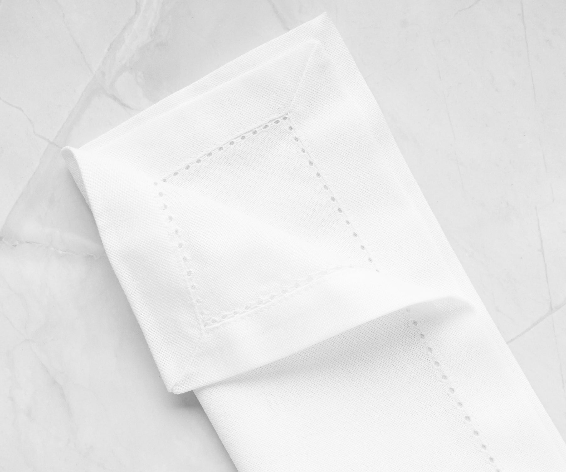 white hemstitch napkins can be tailored to suit different table settings and occasions, ensuring a perfect fit for any dining situation.
