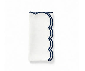 White cotton dinner napkins bulk pack with scalloped edge trim, soft reusable cloth napkins for stylish table décor.
