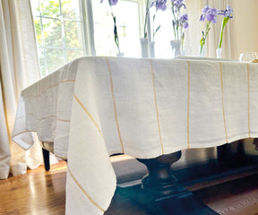 Drape your table in a gold rectangular cloth, adding a touch of spring elegance to elevate any occasion.